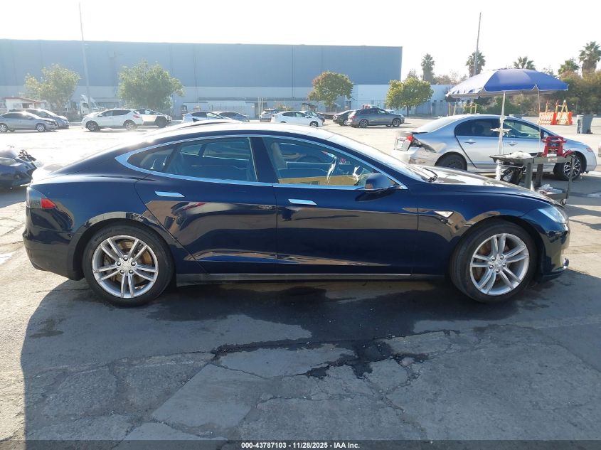 2014 Tesla Model S VIN: 5YJSA1S11EFP36911 Lot: 43787103