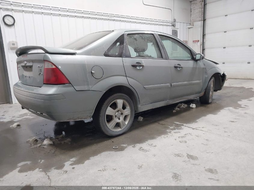 1FAHP34N25W194112 2005 FORD FOCUS photo no. 4