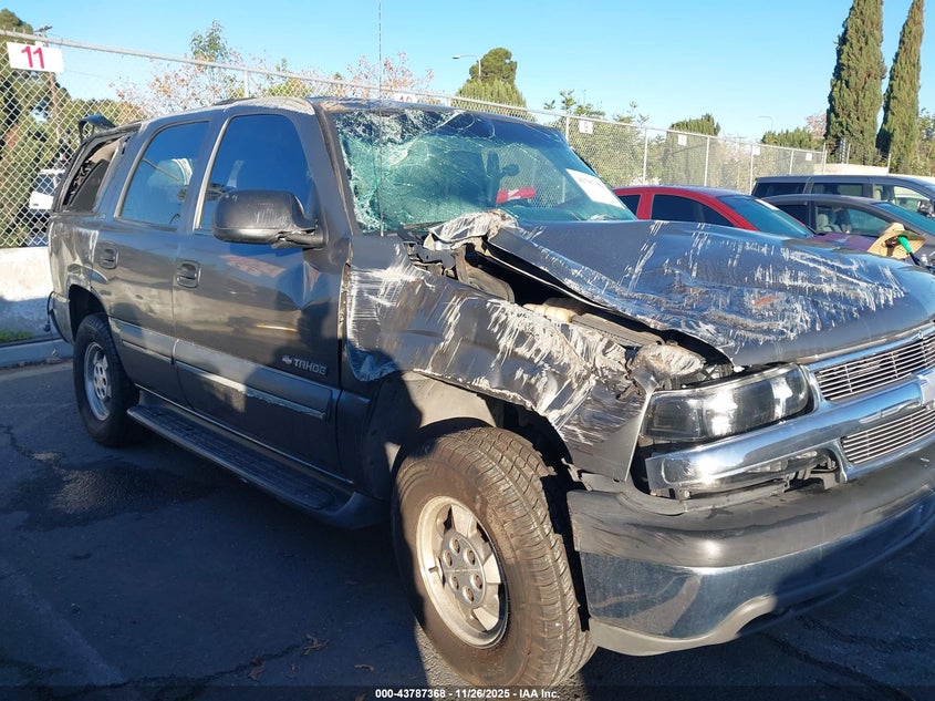 2002 Chevrolet Tahoe Ls VIN: 1GNEC13V82R297583 Lot: 43787368