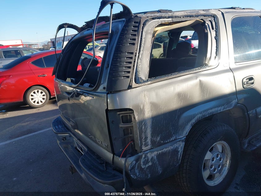 2002 Chevrolet Tahoe Ls VIN: 1GNEC13V82R297583 Lot: 43787368