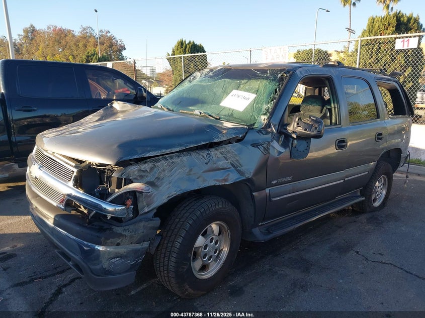 2002 Chevrolet Tahoe Ls VIN: 1GNEC13V82R297583 Lot: 43787368