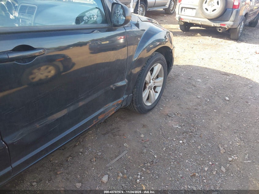 2010 Dodge Caliber Sxt VIN: 1B3CB4HAXAD586956 Lot: 43787574