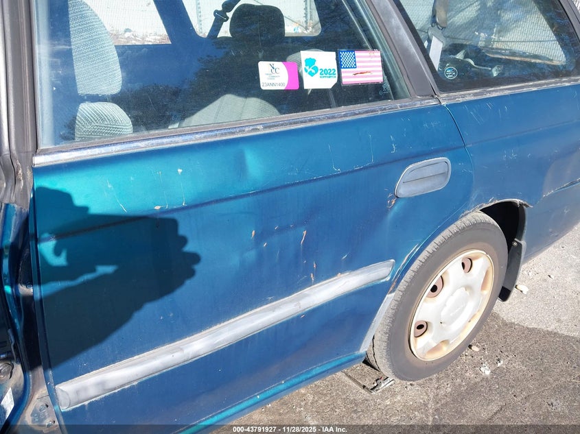 1998 Subaru Legacy L/Right Hand Postal Drive VIN: 4S3BK4351W7321501 Lot: 43791927