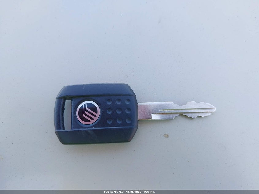 2004 Mercury Grand Marquis Ls VIN: 2MEFM75W24X663077 Lot: 43793759