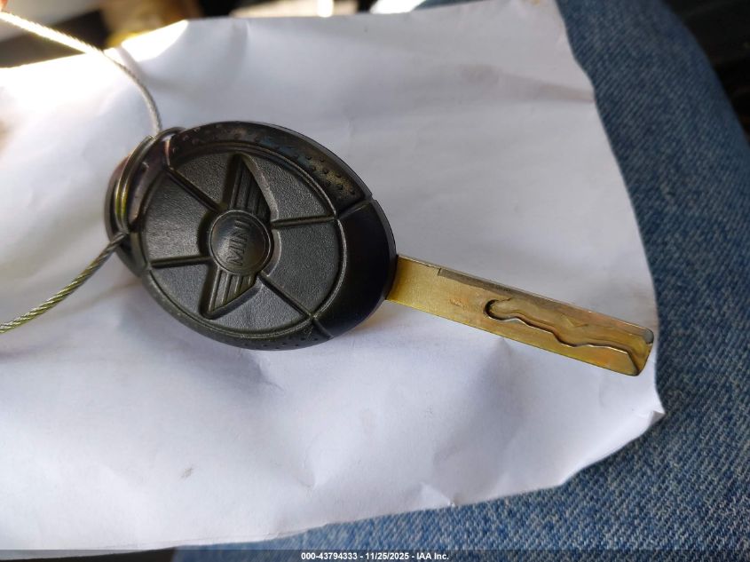 2006 Mini Cooper VIN: WMWRC33536TJ79002 Lot: 43794333