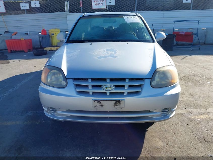2003 Hyundai Accent Gl VIN: KMHCG45C33U492289 Lot: 43796061