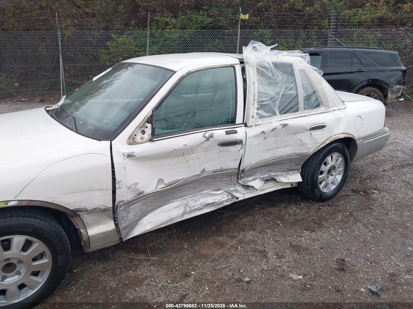 2003 Mercury Grand Marquis Gs VIN: 2MEFM74W23X703173 Lot: 43796682