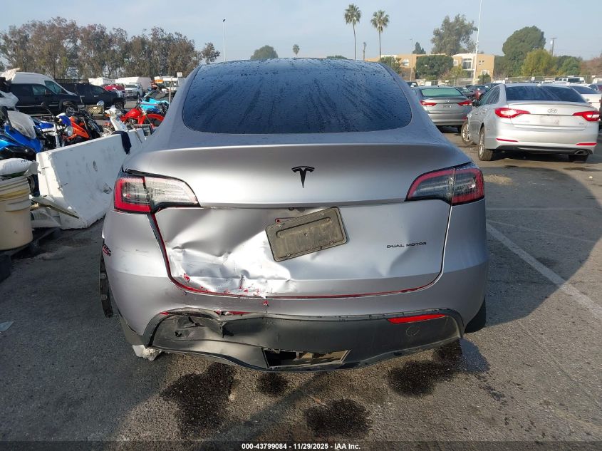 2023 Tesla Model Y Awd/Long Range Dual Motor All-Wheel Drive VIN: 7SAYGAEE6PF751319 Lot: 43799084