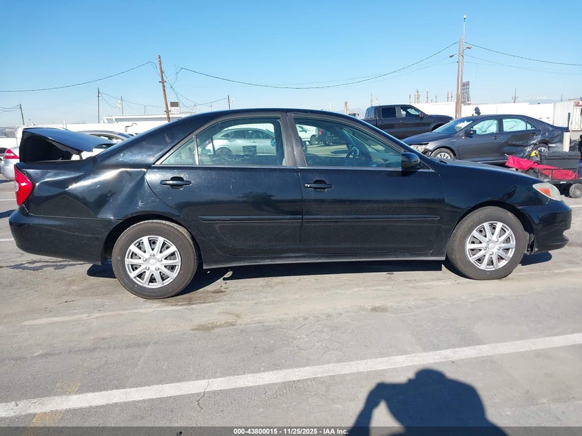 2003 Toyota Camry Le VIN: JTDBE32K130215997 Lot: 43800015