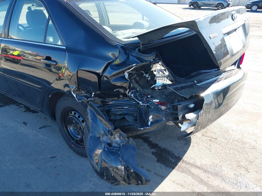 2003 Toyota Camry Le VIN: JTDBE32K130215997 Lot: 43800015