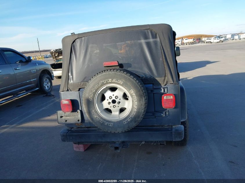 2002 Jeep Wrangler Sport VIN: 1J4FA49SX2P739285 Lot: 43802259