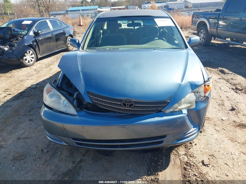 2003 Toyota Camry Le VIN: 4T1BE32K13U786930 Lot: 43804027