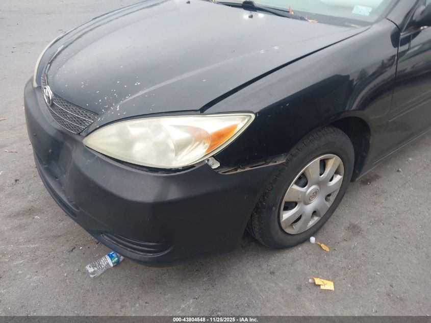 2003 Toyota Camry Le VIN: 4T1BE32K33U165446 Lot: 43804548