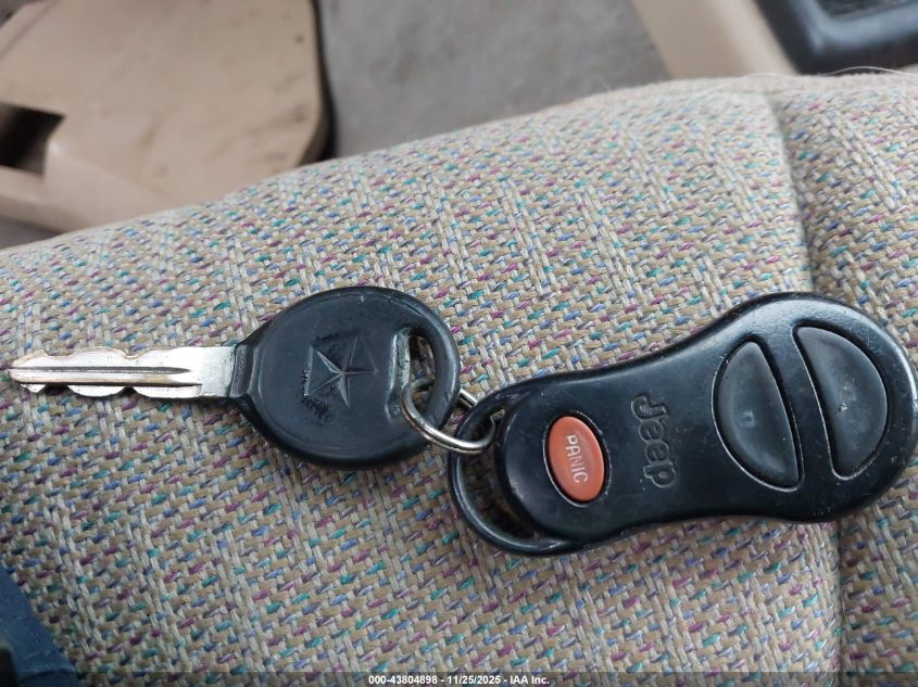 1999 Jeep Cherokee Classic/Sport VIN: 1J4FF68SXXL517472 Lot: 43804898