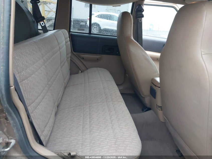 1999 Jeep Cherokee Classic/Sport VIN: 1J4FF68SXXL517472 Lot: 43804898