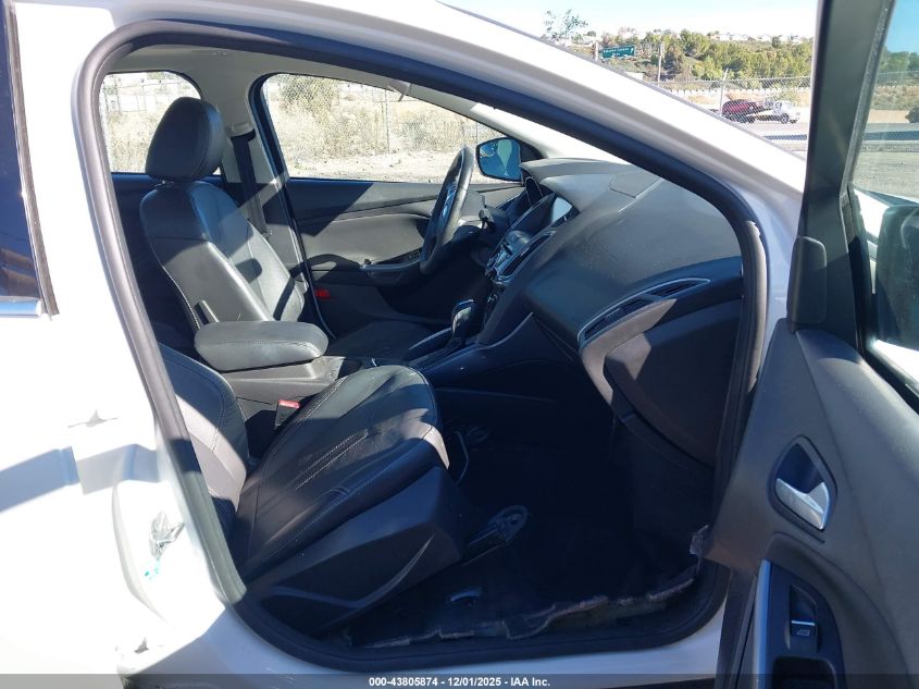 2014 Ford Focus Titanium VIN: 1FADP3J24EL129286 Lot: 43805874