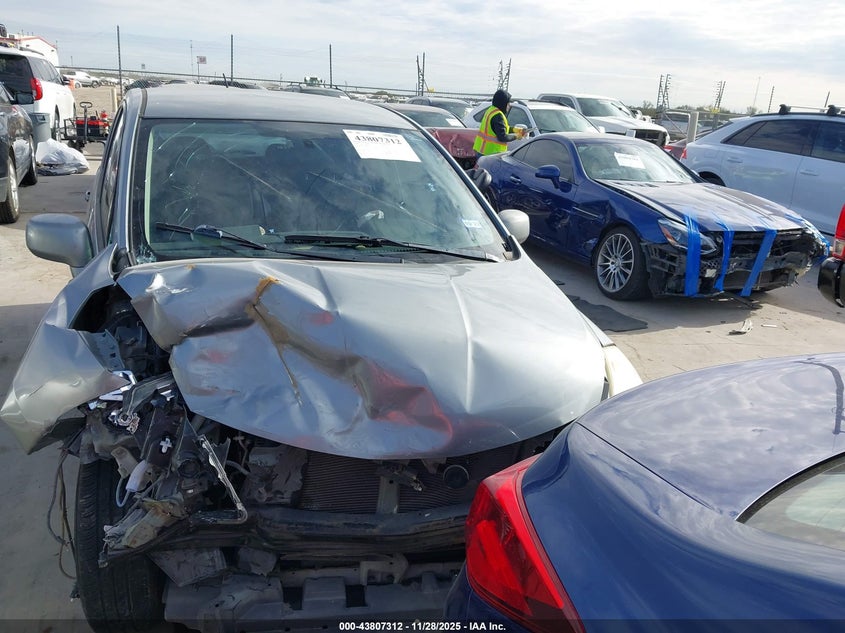 2009 Nissan Versa 1.8Sl VIN: 3N1BC13E39L419153 Lot: 43807312