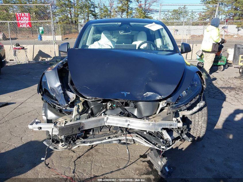 2023 Tesla Model Y Awd/Long Range Dual Motor All-Wheel Drive VIN: 7SAYGDEE9PF891902 Lot: 43808302