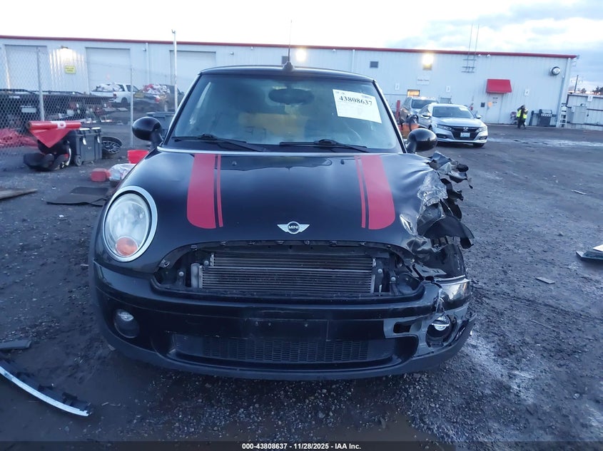 2010 Mini Cooper VIN: WMWMR3C58ATU98557 Lot: 43808637