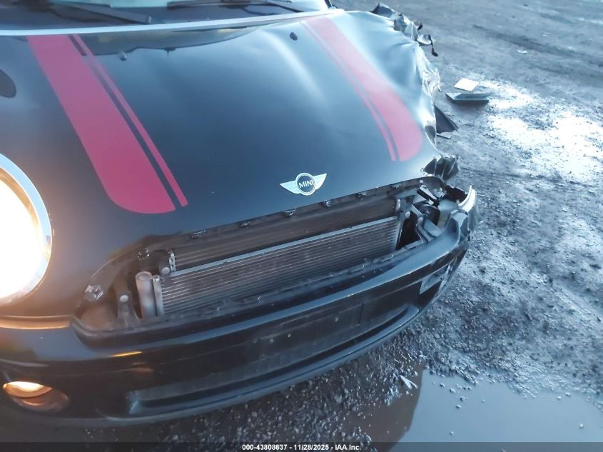 2010 Mini Cooper VIN: WMWMR3C58ATU98557 Lot: 43808637