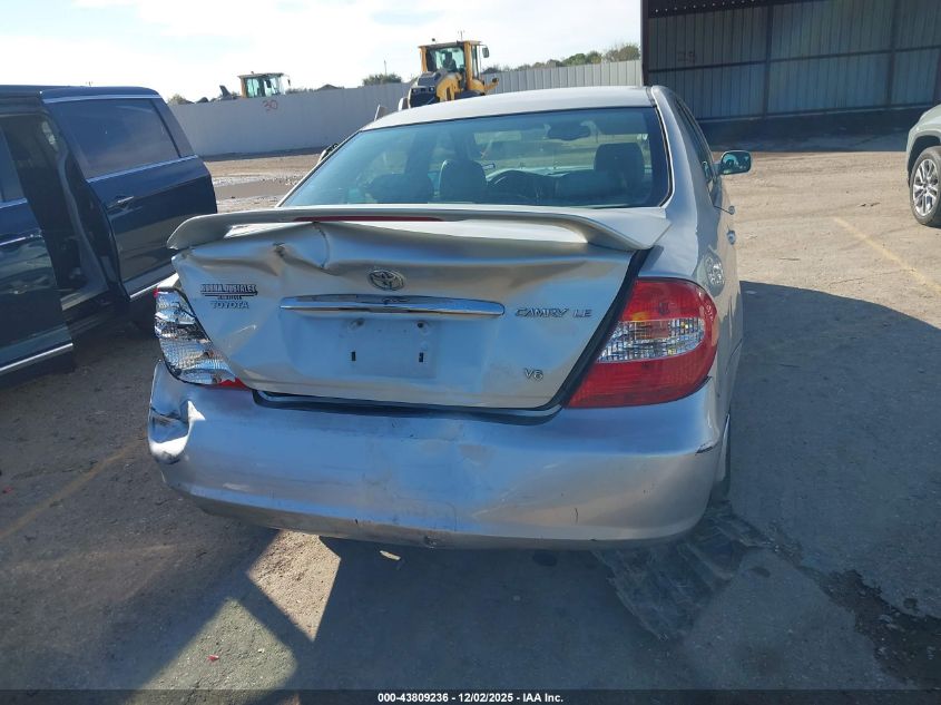 2002 Toyota Camry Le V6 VIN: 4T1BF32K72U015853 Lot: 43809236