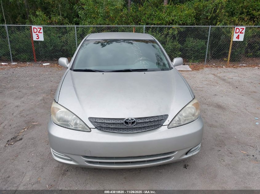 2002 Toyota Camry Le VIN: JTDBE32K020096984 Lot: 43810520