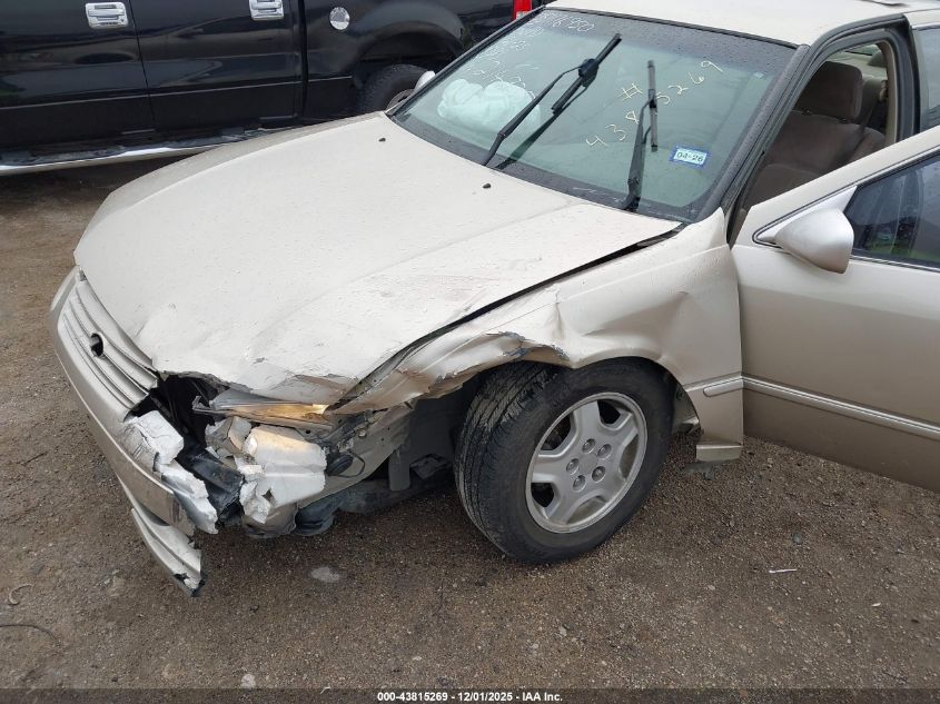 1998 Toyota Camry Le VIN: JT2BG22K5W0214935 Lot: 43815269