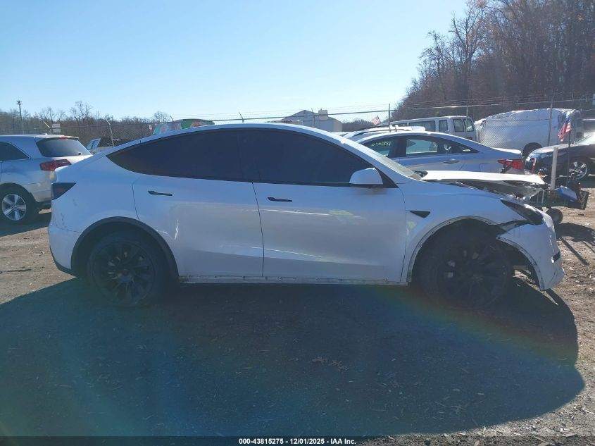 2023 Tesla Model Y Awd/Long Range Dual Motor All-Wheel Drive VIN: 7SAYGDEE5PA030956 Lot: 43815275