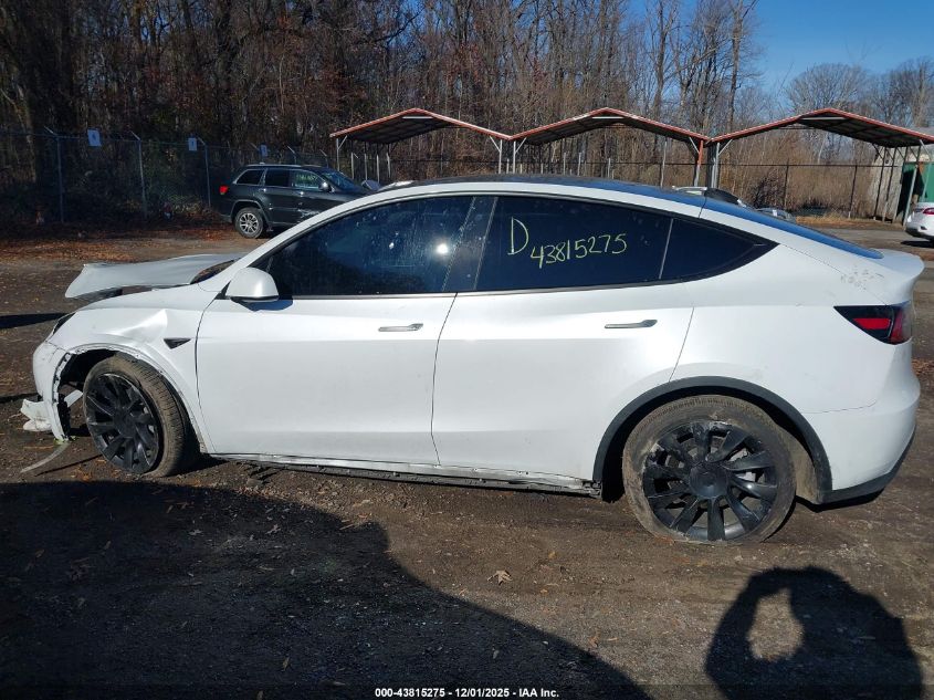 2023 Tesla Model Y Awd/Long Range Dual Motor All-Wheel Drive VIN: 7SAYGDEE5PA030956 Lot: 43815275