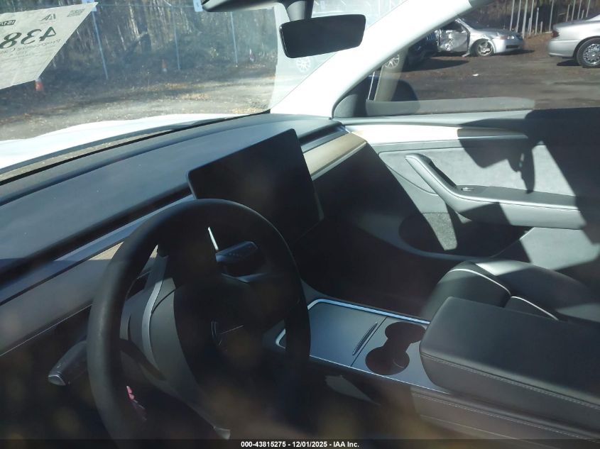 2023 Tesla Model Y Awd/Long Range Dual Motor All-Wheel Drive VIN: 7SAYGDEE5PA030956 Lot: 43815275