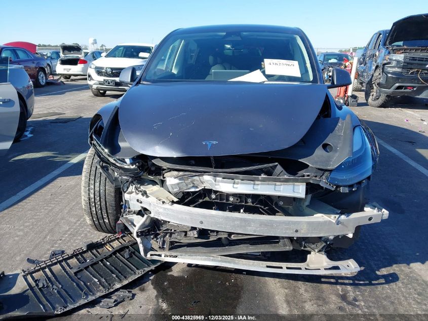 2023 Tesla Model Y Performance Dual Motor All-Wheel Drive VIN: 7SAYGDEF6PF702678 Lot: 43825969