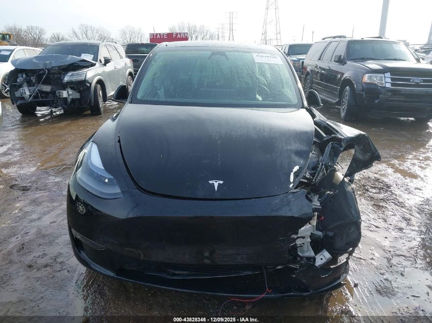 2023 Tesla Model Y Awd/Long Range Dual Motor All-Wheel Drive VIN: 7SAYGDEE2PA075837 Lot: 43828346