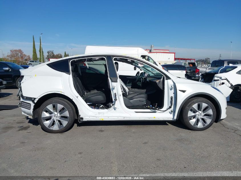 2023 Tesla Model Y Awd/Long Range Dual Motor All-Wheel Drive VIN: 7SAYGDEE6PA156596 Lot: 43830653