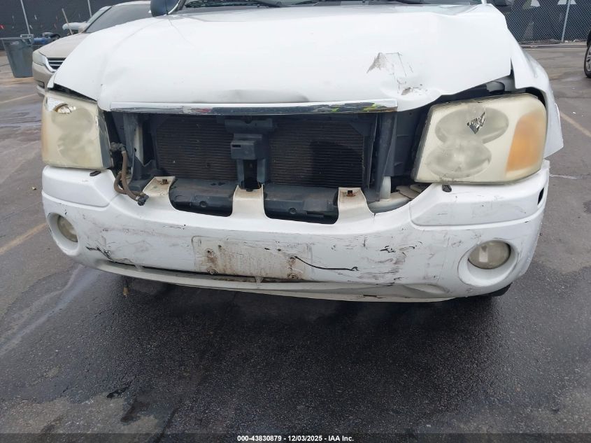 2003 GMC Envoy Slt VIN: 1GKDS13SX32409585 Lot: 43830879