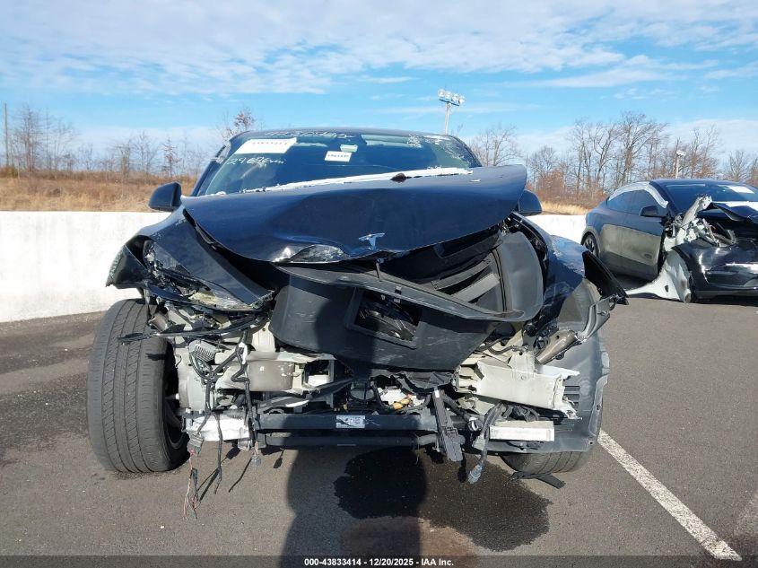 2023 Tesla Model Y Awd/Long Range Dual Motor All-Wheel Drive VIN: 7SAYGAEE7PF800835 Lot: 43833414