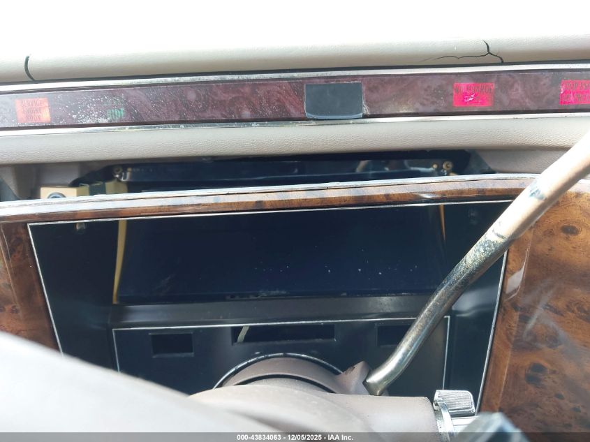 1991 Cadillac Brougham VIN: 1G6DW54E5MR710857 Lot: 43834063