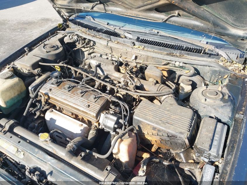 1997 Toyota Corolla Dx VIN: 1NXBB02E2VZ553840 Lot: 43837601