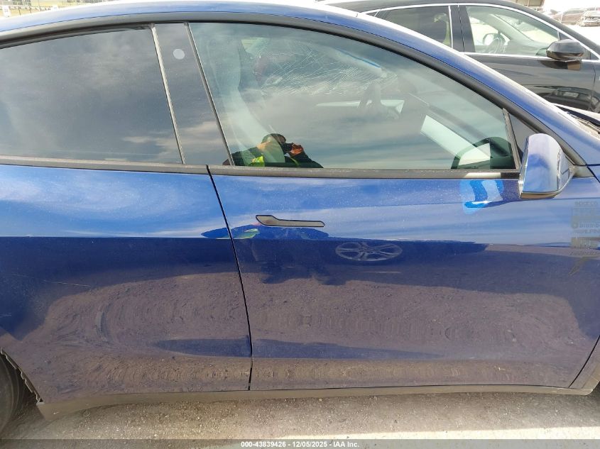 2023 Tesla Model Y Awd/Long Range Dual Motor All-Wheel Drive VIN: 7SAYGAEE5PF644181 Lot: 43839426