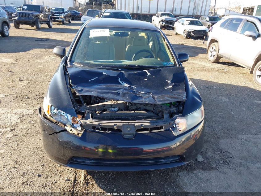 2006 Honda Civic Lx VIN: 1HGFA165X6L099158 Lot: 43842781