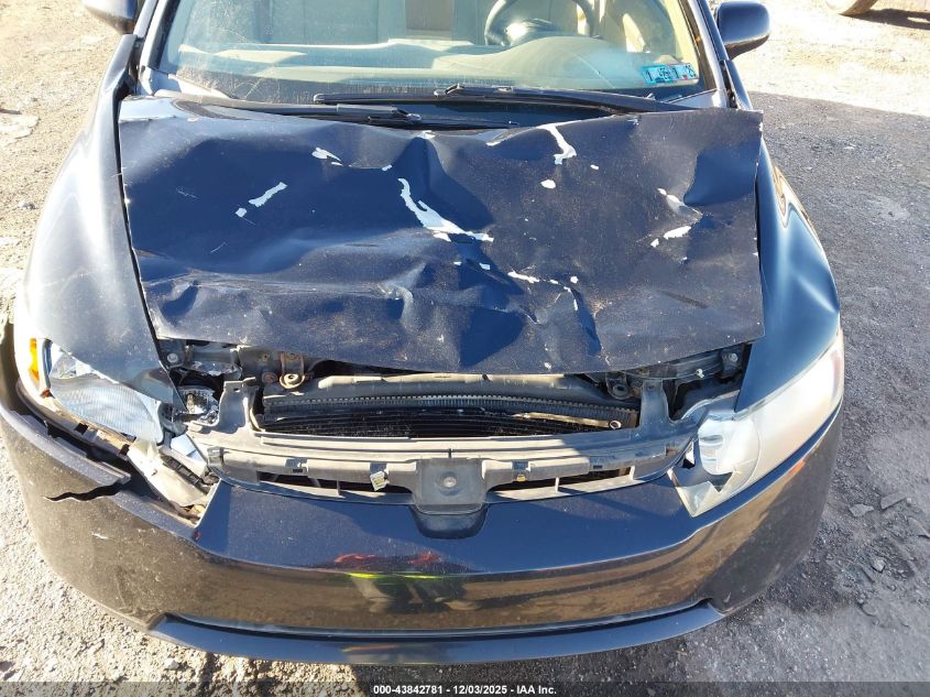 2006 Honda Civic Lx VIN: 1HGFA165X6L099158 Lot: 43842781