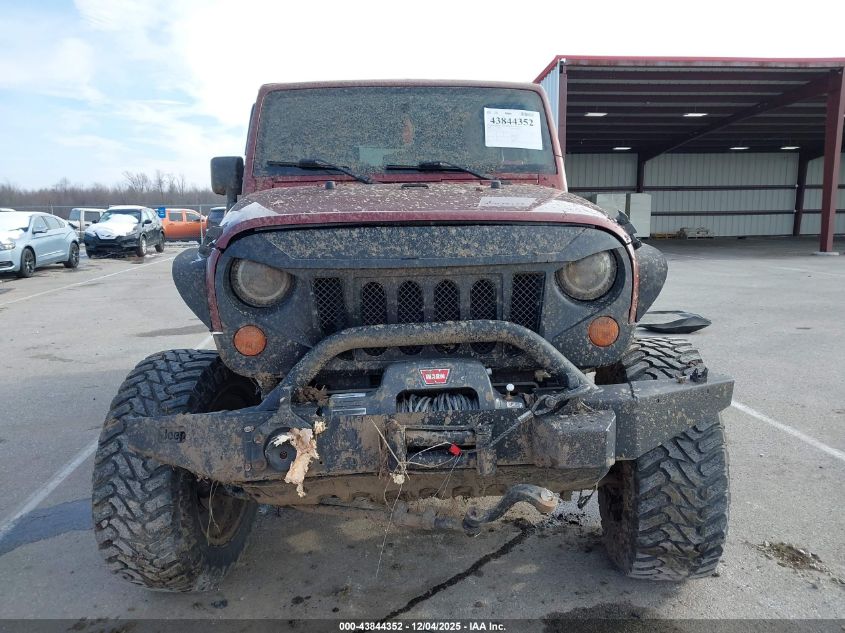 2007 Jeep Wrangler Unlimited Sahara VIN: 1J8GA59177L149155 Lot: 43844352