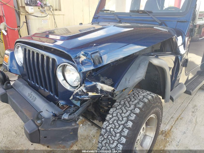 2002 Jeep Wrangler Sport VIN: 1J4FA49S62P737288 Lot: 43846275