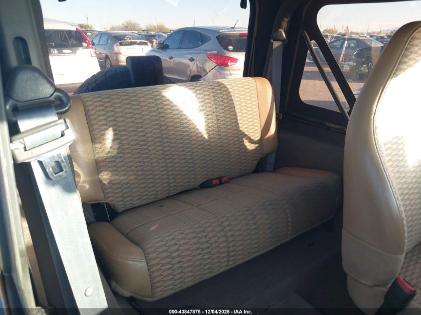 2000 Jeep Wrangler Se VIN: 1J4FA29P9YP785909 Lot: 43847875