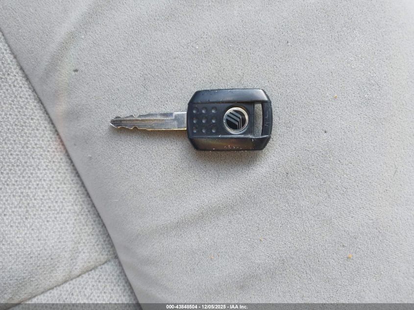 2005 Mercury Grand Marquis Gs VIN: 2MEFM74W15X673215 Lot: 43848504