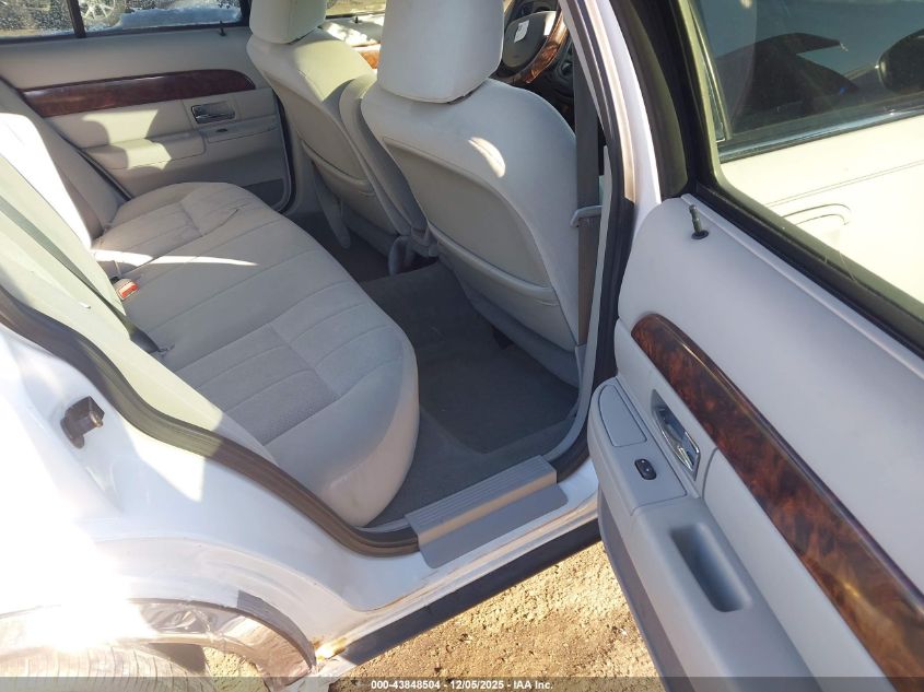 2005 Mercury Grand Marquis Gs VIN: 2MEFM74W15X673215 Lot: 43848504