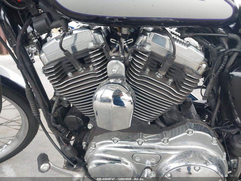 2009 Harley-Davidson Xl1200 C VIN: 1HD1CT3149K455385 Lot: 43849747