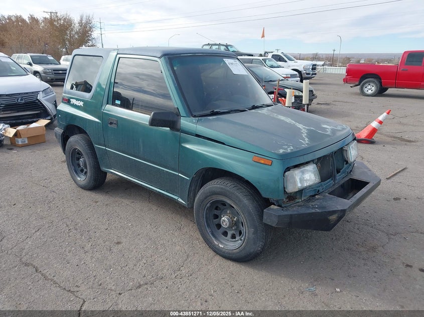 2CNBJ1865V6924416 1997 Geo Tracker Softtop auction photo 1