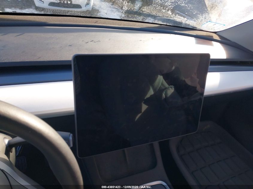 2023 Tesla Model Y VIN: 7SAYGDEE2PA186128 Lot: 43851423