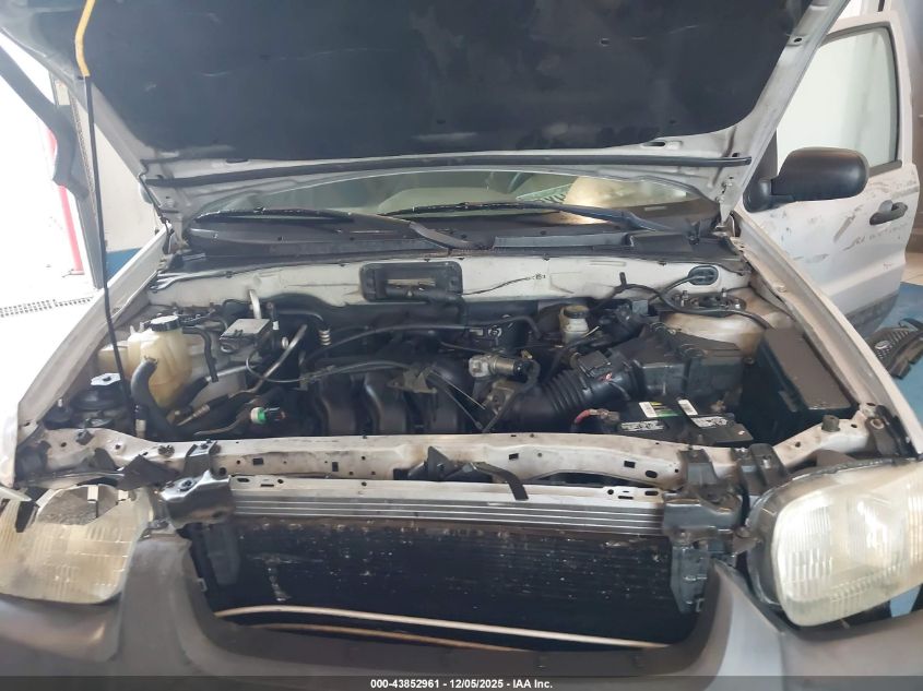 2002 Ford Escape Xls VIN: 1FMYU01162KC84834 Lot: 43852961