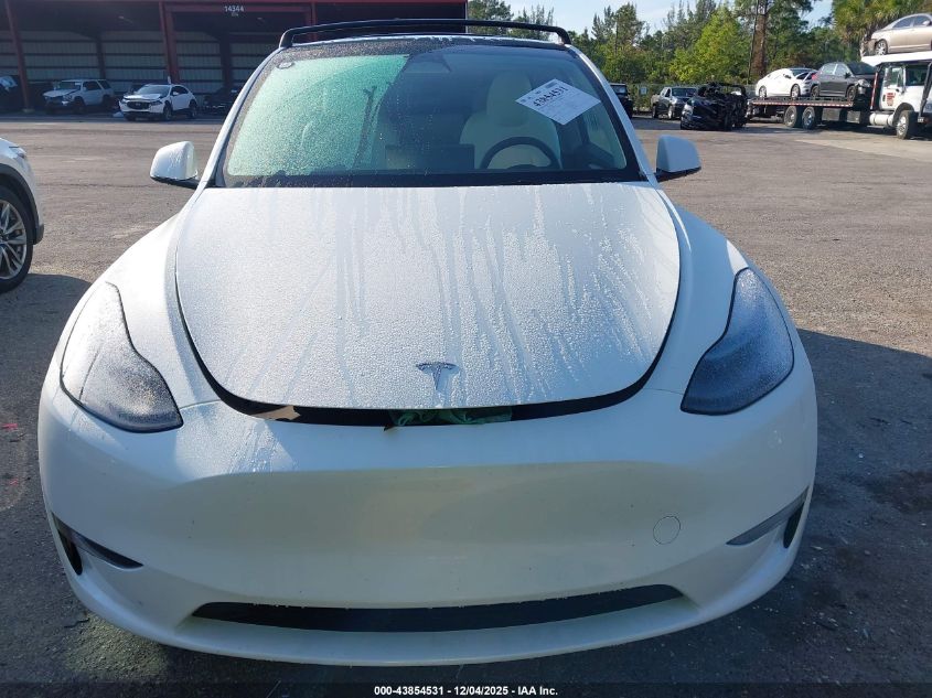 2023 Tesla Model Y Awd/Long Range Dual Motor All-Wheel Drive VIN: 7SAYGAEE2PF640590 Lot: 43854531